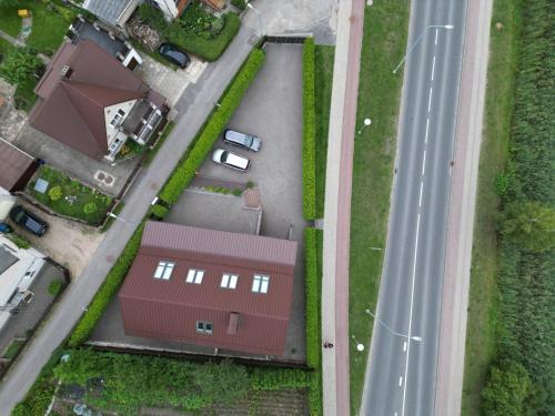 an overhead view of a building and a road at Prie Žiedo in Trakai