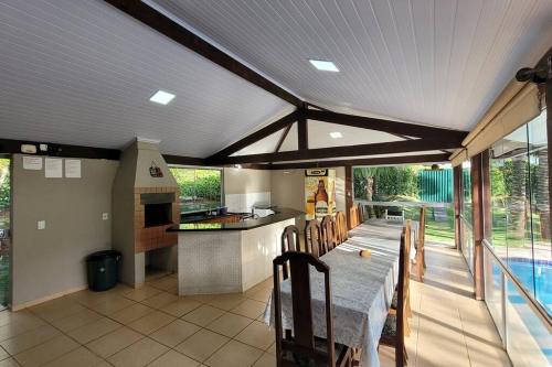 Swimmingpoolen hos eller tæt på Casa Escarpas do Lago - Capitólio - MG