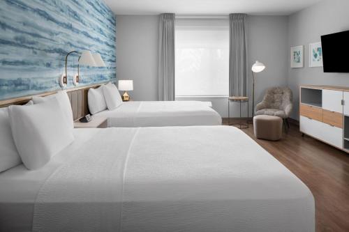 מיטה או מיטות בחדר ב-TownePlace Suites by Marriott Sacramento Rancho Cordova