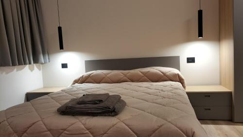 Postel nebo postele na pokoji v ubytování fragilerooms