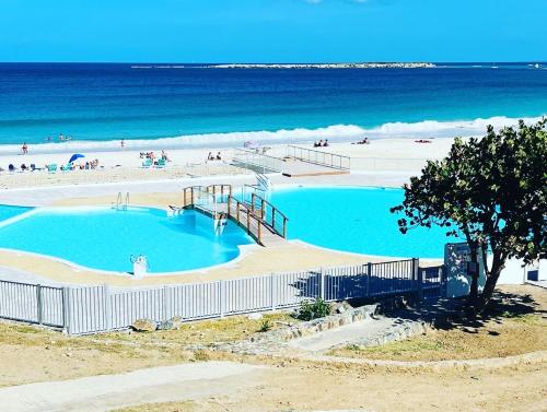 Πισίνα στο ή κοντά στο Mont Vernon Top Secret Studio chic, plage et piscine