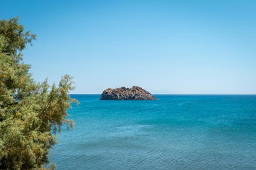 a small island in the middle of the ocean at Sappho Hotel in Skala Eresou