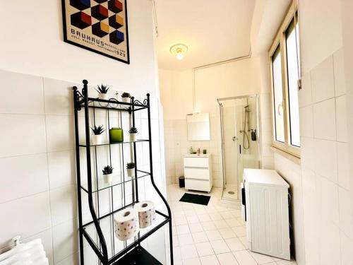 a bathroom with a white tiled floor and a toilet at Attico lussuoso Roma centro in Rome