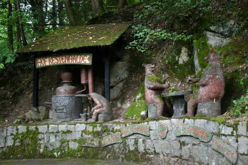 a group of statues of bears in front of a building at Renatas Ferienwohnung Sasbachwalden in Sasbachwalden