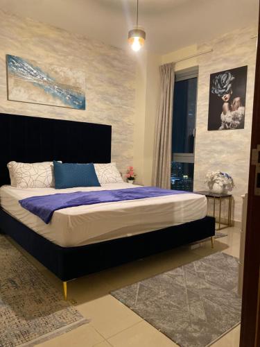 Postel nebo postele na pokoji v ubytování Standpoint Tower Apartment opposite Burj Khalifa