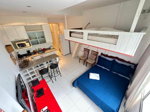an overhead view of a small room with a bed and a kitchen at STUDIO COPA IPA ARPOADOR Ap 304 in Rio de Janeiro