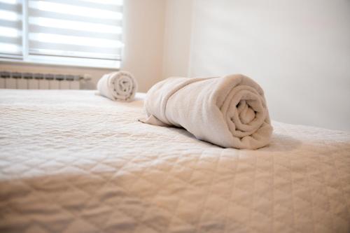 Cama ou camas em um quarto em New Formula