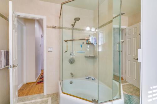 a glass shower in a bathroom with a sink at North Hills Oasis with Private Pool and Fireplace! in North Hills