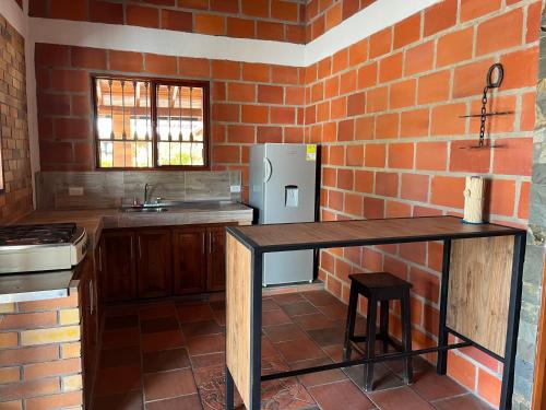 A kitchen or kitchenette at Cabaña Villa Lucia
