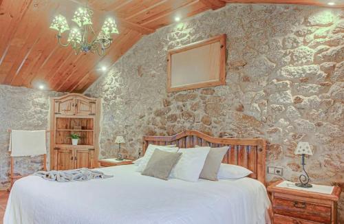 Ένα ή περισσότερα κρεβάτια σε δωμάτιο στο Villamia