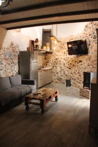Kuchyň nebo kuchyňský kout v ubytování Alojamiento Rural La Plazuela
