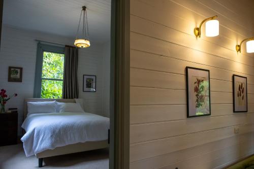 Llit o llits en una habitació de Ard Choille Cottages