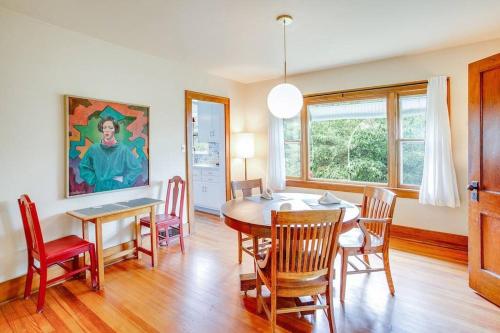 a dining room with a table and chairs at Artist’s Vintage Home 5 mins from ND Campus in South Bend