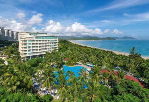 an aerial view of the resort and the beach at Sunshine Resort Intime Sanya in Sanya