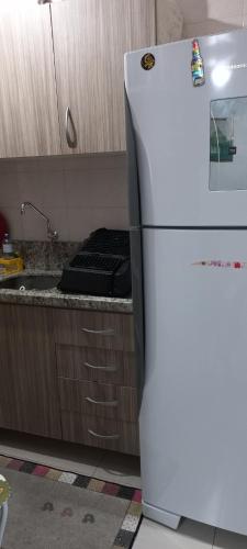 Køkken eller tekøkken på Apartamento ótima localização