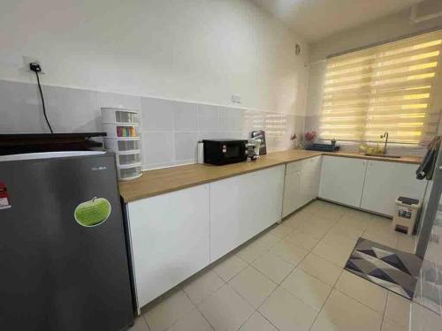 Kuchyň nebo kuchyňský kout v ubytování Apartment Putrajaya Presint 16