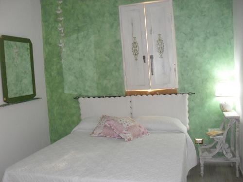 Cama o camas de una habitación en Fattoria La Traccia