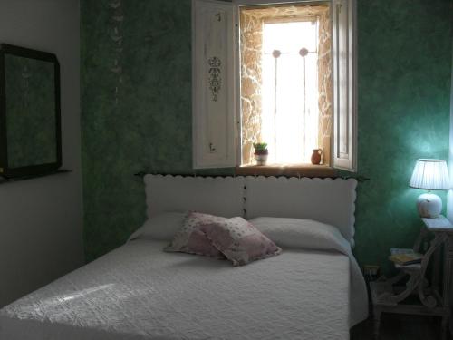 Cama o camas de una habitación en Fattoria La Traccia