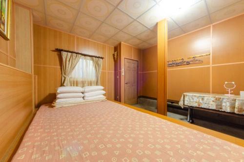 Postel nebo postele na pokoji v ubytování Sun Lu Holiday Homestay
