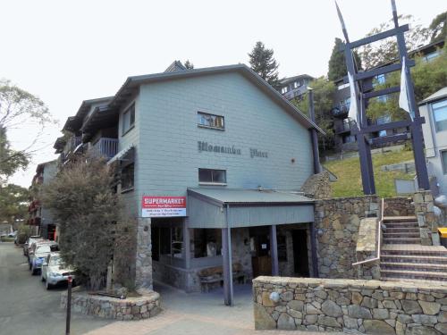 a building on the side of a street at Mowamba E1 in Thredbo