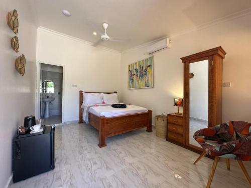 Voodi või voodid majutusasutuse Shivo Guest House toas