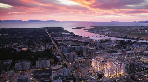 an aerial view of a city and a body of water at Gorgeous Place In Downtown RMD in Richmond