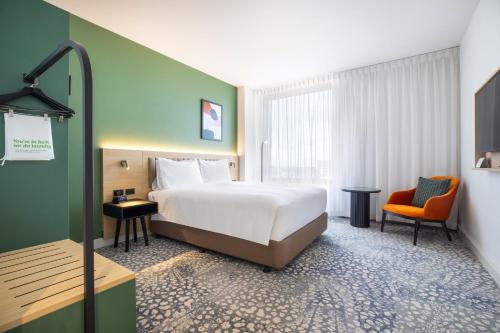 Postel nebo postele na pokoji v ubytování Holiday Inn Dandenong by IHG