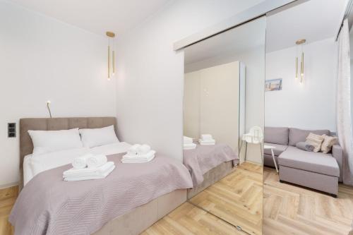 Krevet ili kreveti u jedinici u okviru objekta Apartament Piaskowy Ku Morzu by HolidaySun