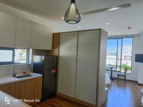 A kitchen or kitchenette at Tree Homestay