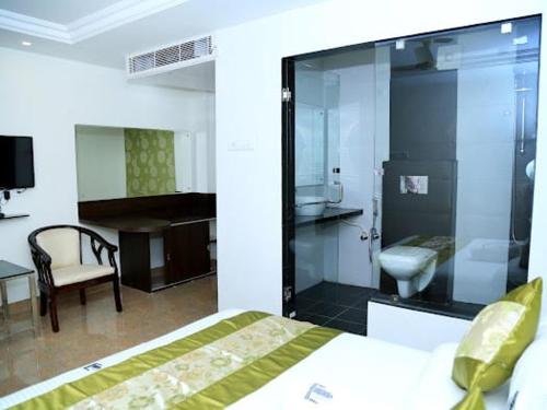 Ванная комната в Hotel Swathi Urban Nest