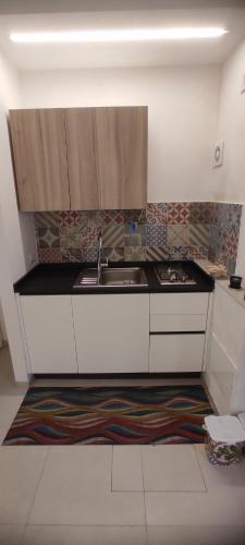 Dapur atau dapur kecil di Casa vacanze TRINISULA Sicily home