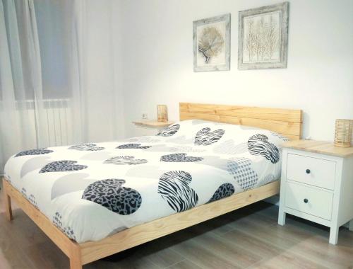 Postel nebo postele na pokoji v ubytování Jardín Araguás