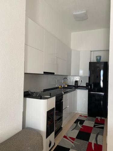Kuchyň nebo kuchyňský kout v ubytování Unas apartment