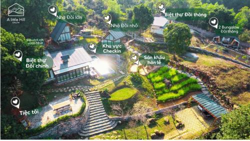 an aerial view of a garden with stairs and plants at A Little Hill Retreat in Hòa Bình