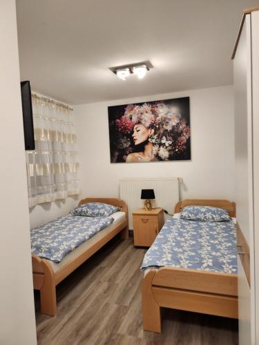 Voodi või voodid majutusasutuse Apartma Maka toas