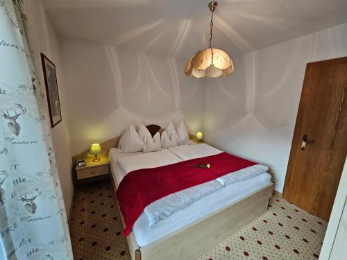 Ein Bett oder Betten in einem Zimmer der Unterkunft Appartements Waldruh