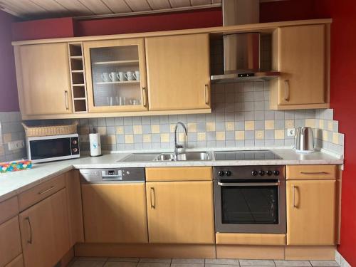 Kuchyň nebo kuchyňský kout v ubytování Ferienwohnung Aischgrund
