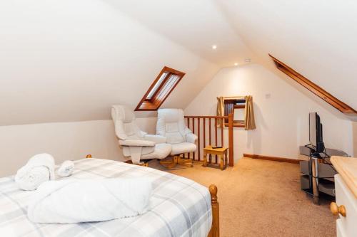 Katil atau katil-katil dalam bilik di The Dairy Bothy at Clauchan Holiday Cottages