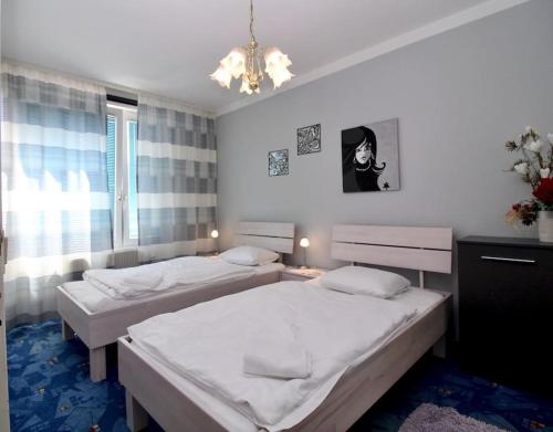 Posteľ alebo postele v izbe v ubytovaní Cozy Apartment FREE parking