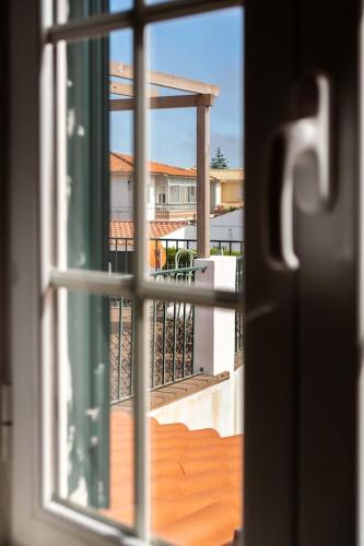 a view of a balcony from a window at Sea´ya Thoughtful Stays - Villa Areia in Cascais
