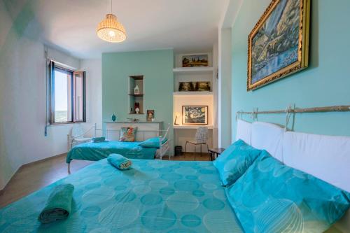Llit o llits en una habitació de Piazza Laurino Apartments
