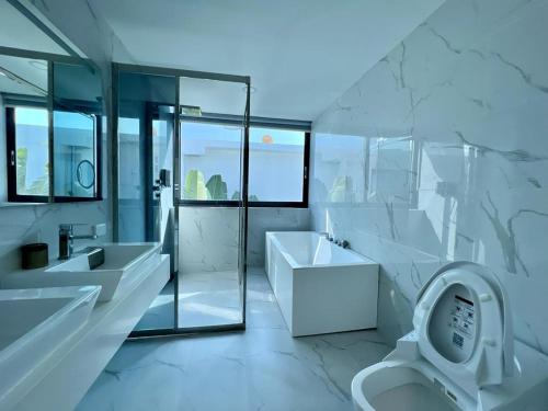 Fotografie z fotogalerie ubytování Palm Spring Pool Villa v destinaci Pattaya South