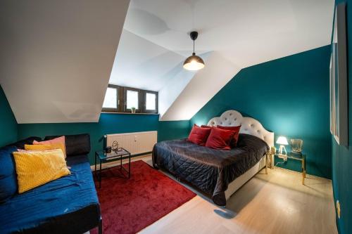 a living room with a bed and a couch at Bismarck Apt mit schönem Balkon in Bad Ems