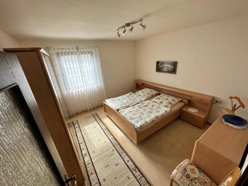 Llit o llits en una habitació de Ferienwohnung Schömberg