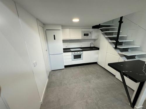 Apartamento tipo Dúplex - NO SE ADMITEN MASCOTAS, NO PETS tesisinde mutfak veya mini mutfak