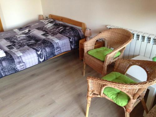 Postel nebo postele na pokoji v ubytování Winnica Płochockich Country House