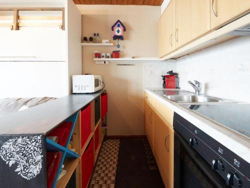 Virtuve vai virtuves zona naktsmītnē Apartment Dixence 404 by Interhome