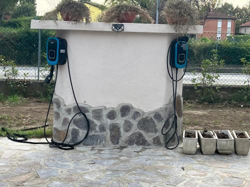 a wall with two phones plugged into it at ANGI B&B in Budrio