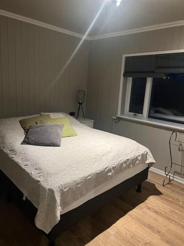 Postel nebo postele na pokoji v ubytování Sunny Westman Islands Apartment