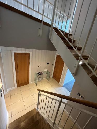 a view of a staircase in a building at Century Wharf Apartments by Urban Space in Cardiff